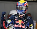 Mark Webber celebrates taking pole position in Spain