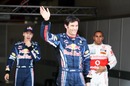 Mark Webber waves to the crowd after taking pole
