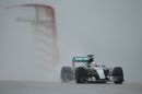 Lewis Hamilton on track with full wet tyres