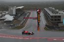 Alexander Rossi on track in wet condition