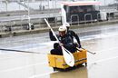 Sauber mechanics with an improvised rowing boat in pit lane