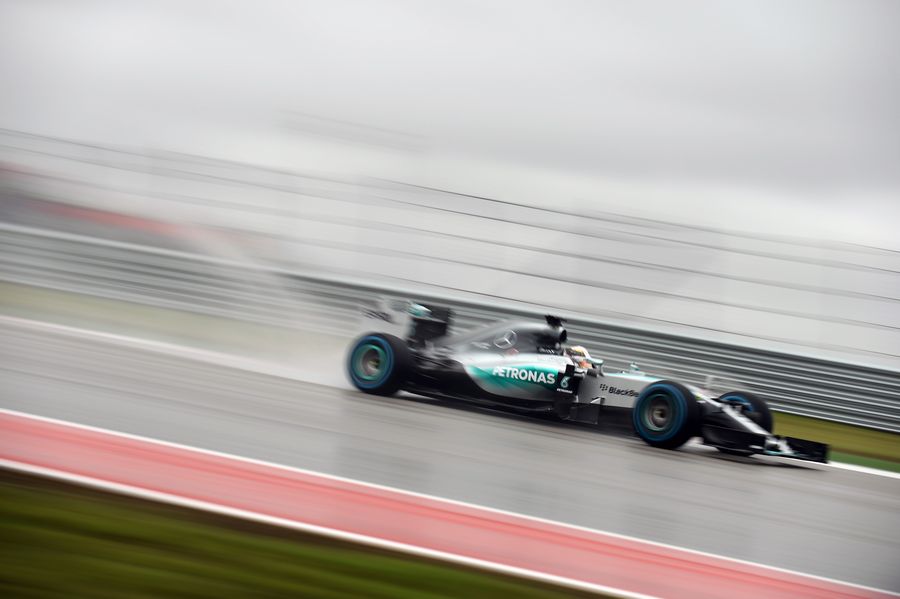 Lewis Hamilton at speed on wet track
