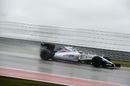 Felipe Massa pushes hard on wet track