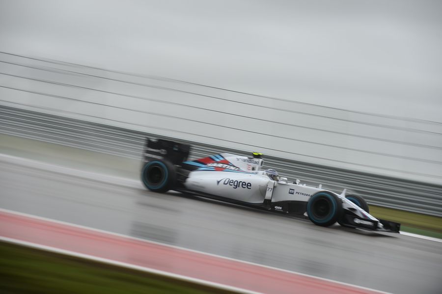 Valtteri Bottas at speed on wet track