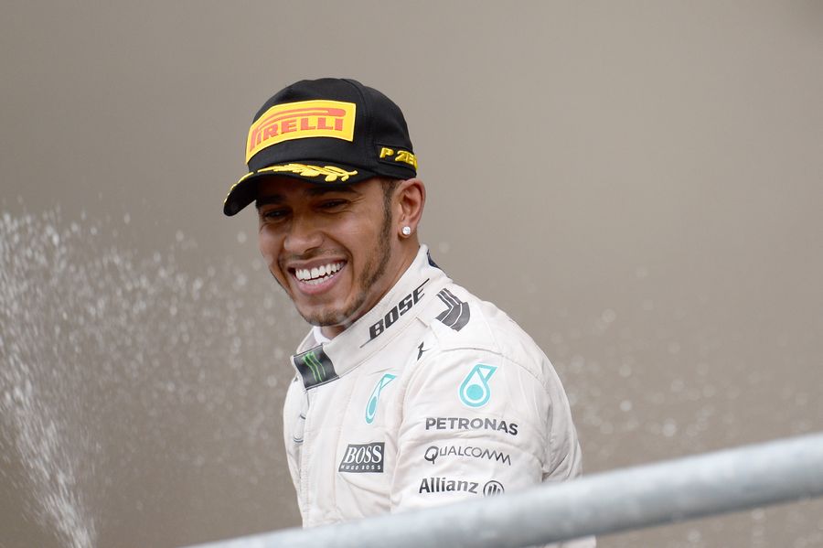 Race winner and the 2015 drivers champion Lewis Hamilton