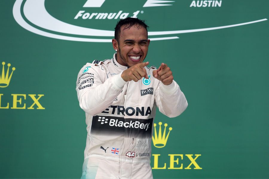Lewis Hamilton celebrates in the podium