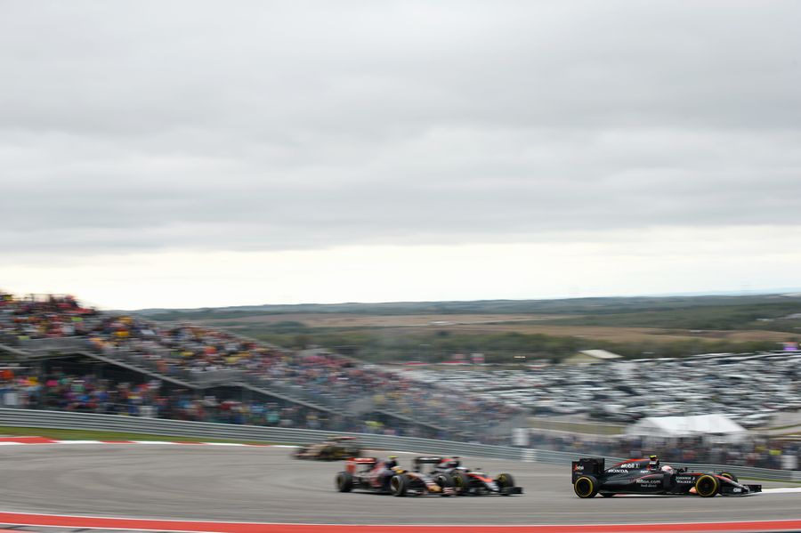 Jenson Button fights a position with competitors including his teammate