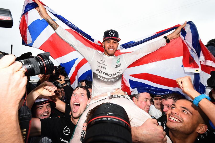 Lewis Hamilton celebrates with Mercedes