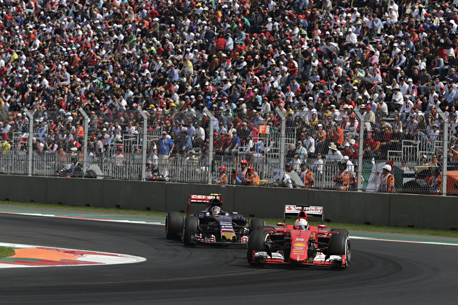 Sebastian Vettel works hard to get back positions