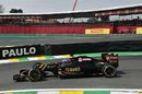 Jolyon Palmer rounds the apex in the Lotus