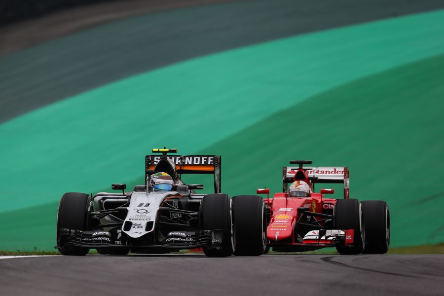 Sergio Perez leads Sebastian Vettel