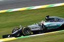 Lewis Hamilton puts on a set of soft tyres