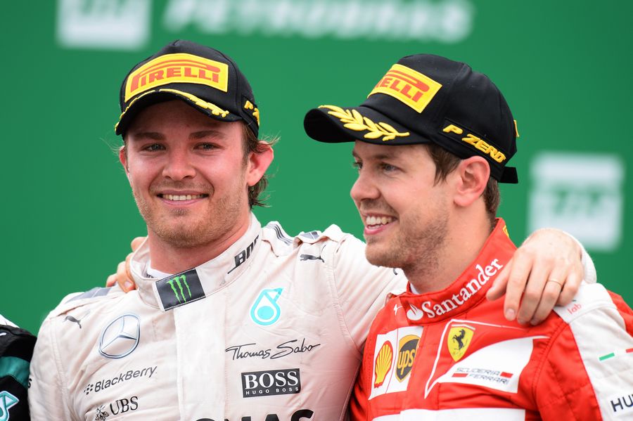 Nico Rosberg and Sebastian Vettel celebrates on the podium