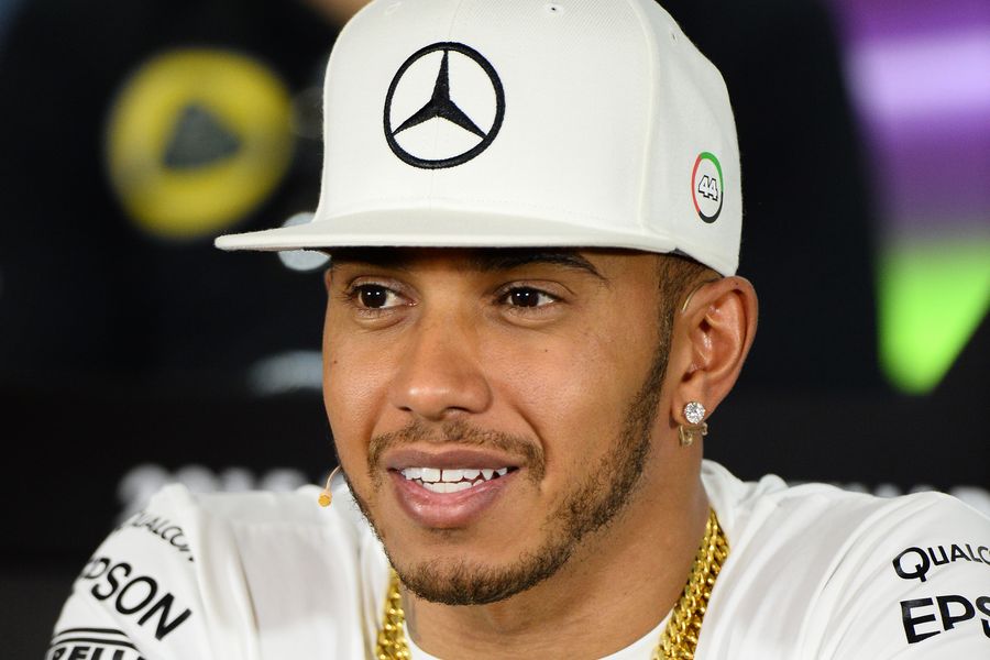 Lewis Hamilton talks to media during the press conference on Thursday