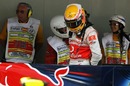 Lewis Hamilton sneaks an admiring glance at the Red Bull