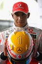 Lewis Hamilton shows of the Steinmetz diamonds embedded in his racing helmet for the 2009 Monaco Grand Prix