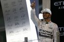 Lewis Hamilton celebrates on the podium