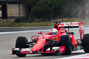 Sebastian Vettel on track in the Ferrari SF15-T