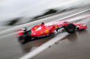 Sebastian Vettel at speed in the Ferrari SF15-T