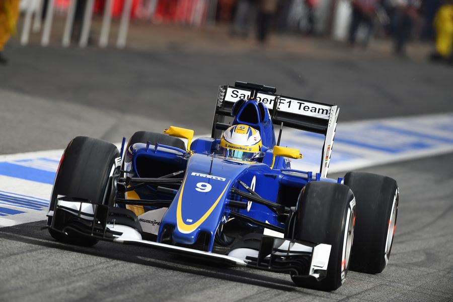 Marcus Ericsson makes his way down the pit lane in the Sauber C34
