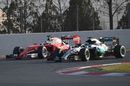 Sebastian Vettel and Nico Rosberg battle for a position