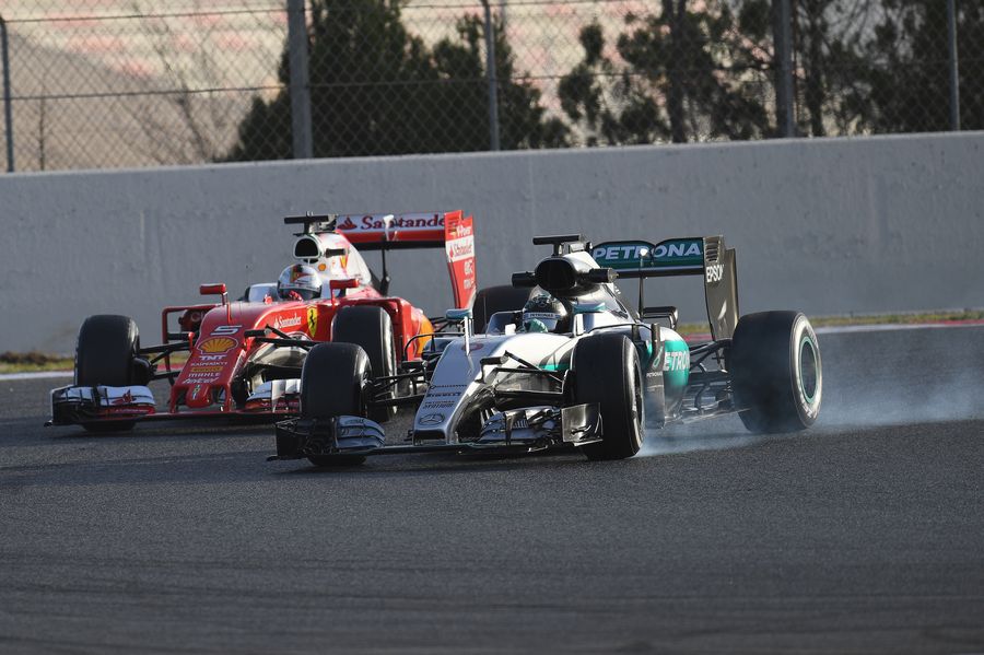 Nico Rosberg has a heavy lock up ahead of Sebastian Vettel