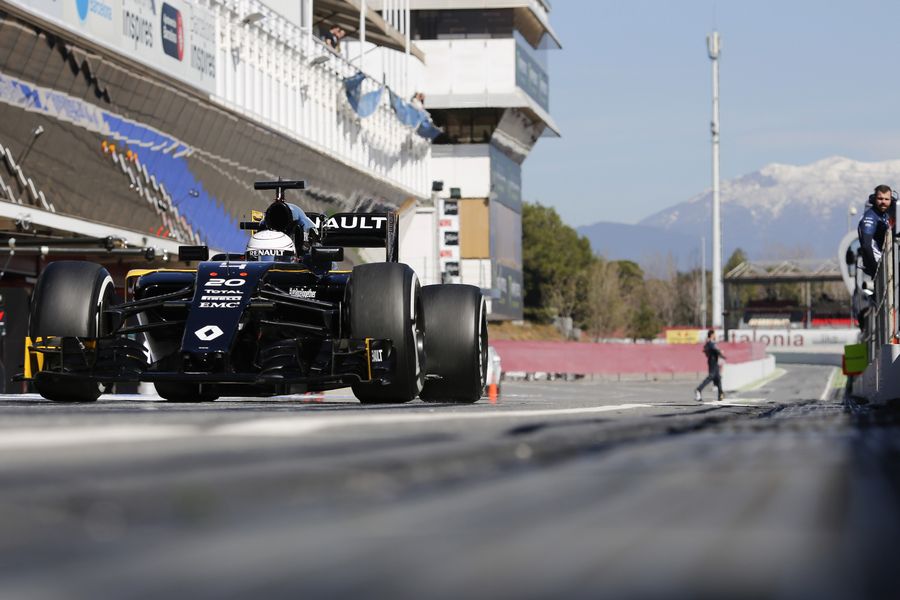 Kevin Magnussen makes his way down the pit lane
