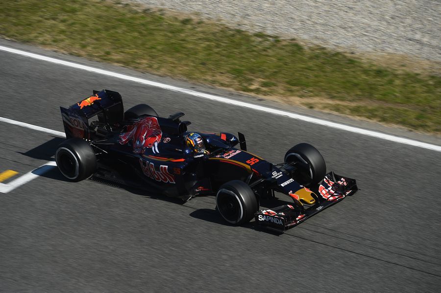 Carlos Sainz at speed in the Toro Rosso STR11