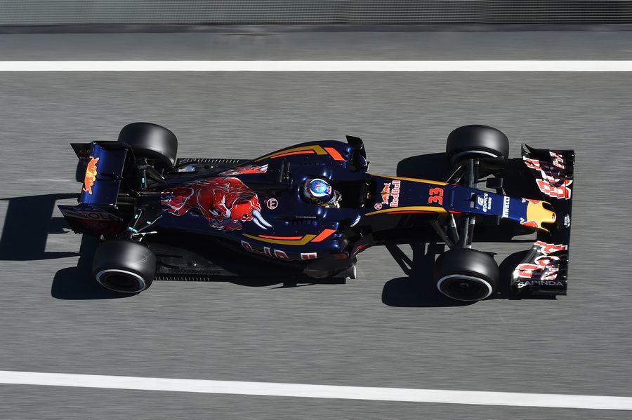 Max Verstappen makes his way down the pit lane