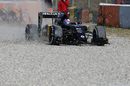 Jolyon Palmer spins through the gravel