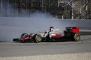 Romain Grosjean spins into the gravel