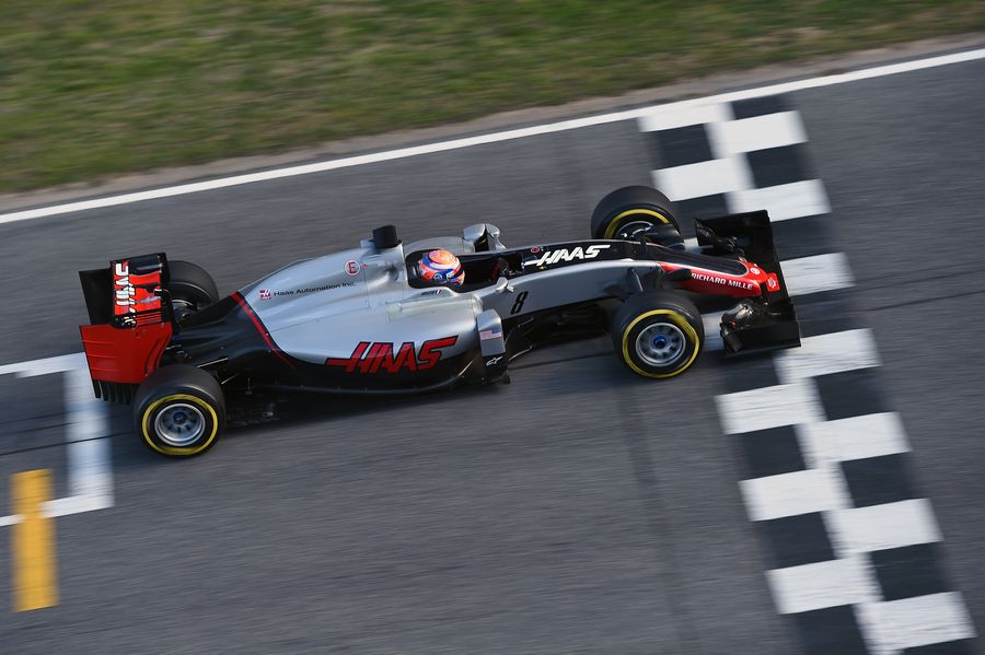 Romain Grosjean crosses the line in the Haas VF-16