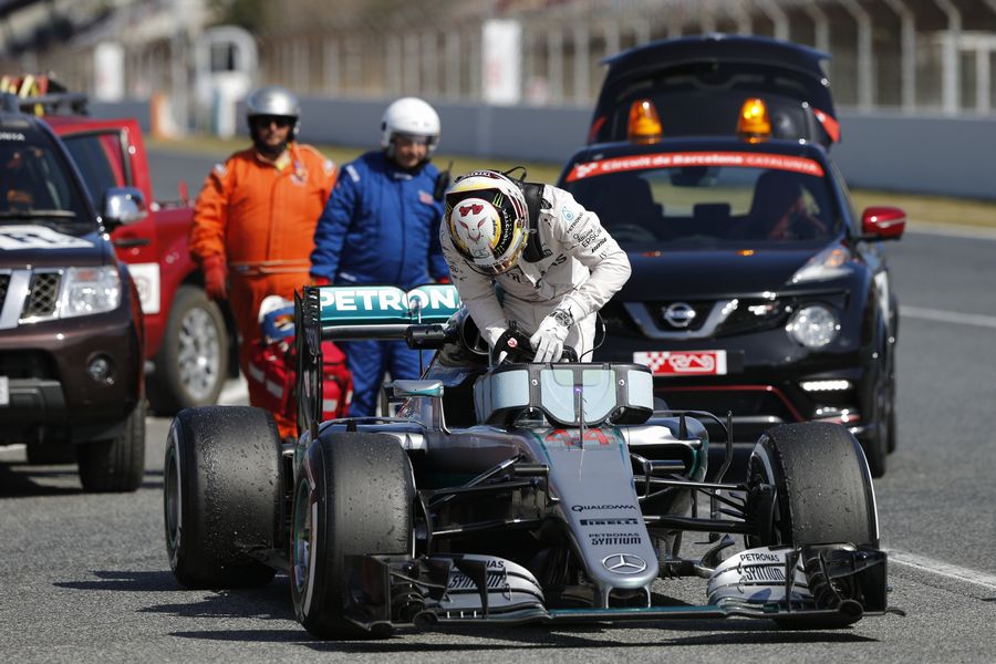 Lewis Hamilton stops at the end of pit lane