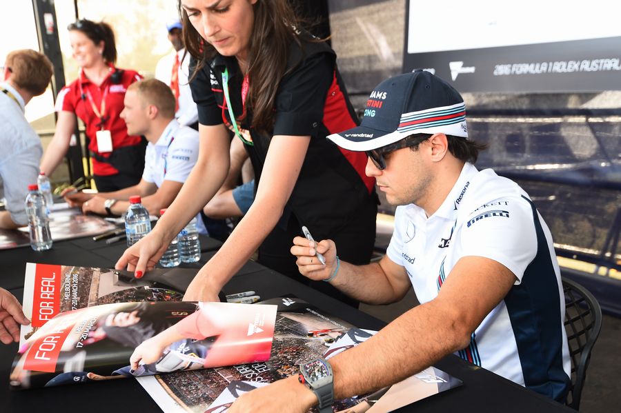Felipe Massa signs autographs
