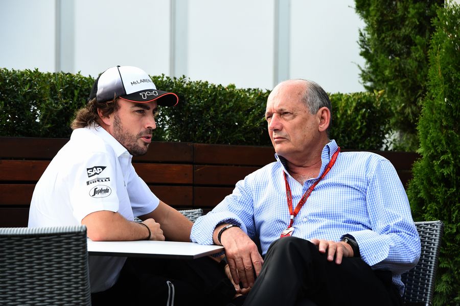 Fernando Alonso chats with Ron Dennis