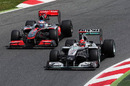 Jenson Button challenges Michael Schumacher for position