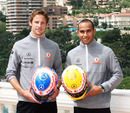 Jenson Button and Lewis Hamilton show off their Steinmetz diamond encrusted helmets for Monaco