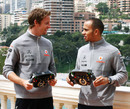 Jenson Button and Lewis Hamilton with their Steinmetz diamond encrusted steering wheels for Monaco