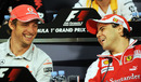 Jenson Button and Felipe Massa share a joke at the press conference