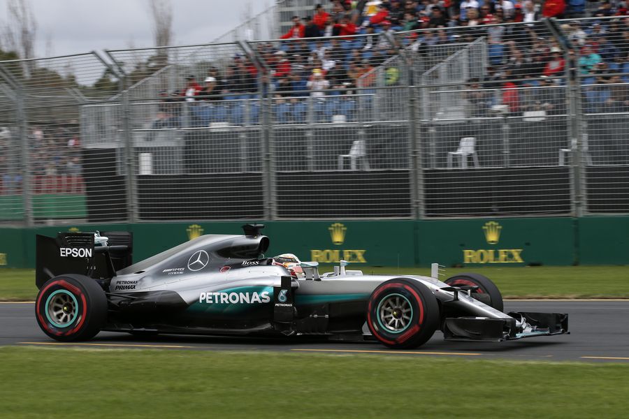 Lewis Hamilton puts on a set of super-soft tyres