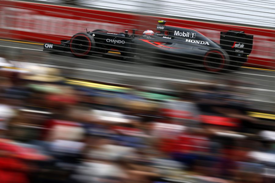 Jenson Button on track in the MP4-31 with super-soft tyres