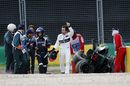 Fernando Alonso gives the thumbs up after his crash