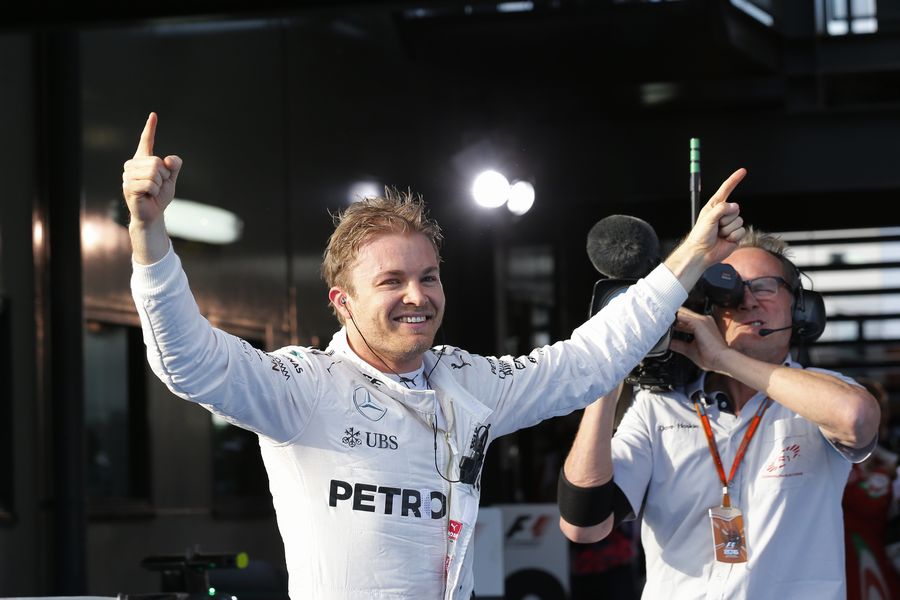 Race winner Nico Rosberg celebrates in parc ferme