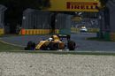Kevin Magnussen suffers a puncture