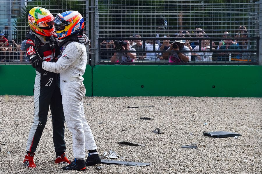 Fernando Alonso and Esteban Gutierrez hug after their crash