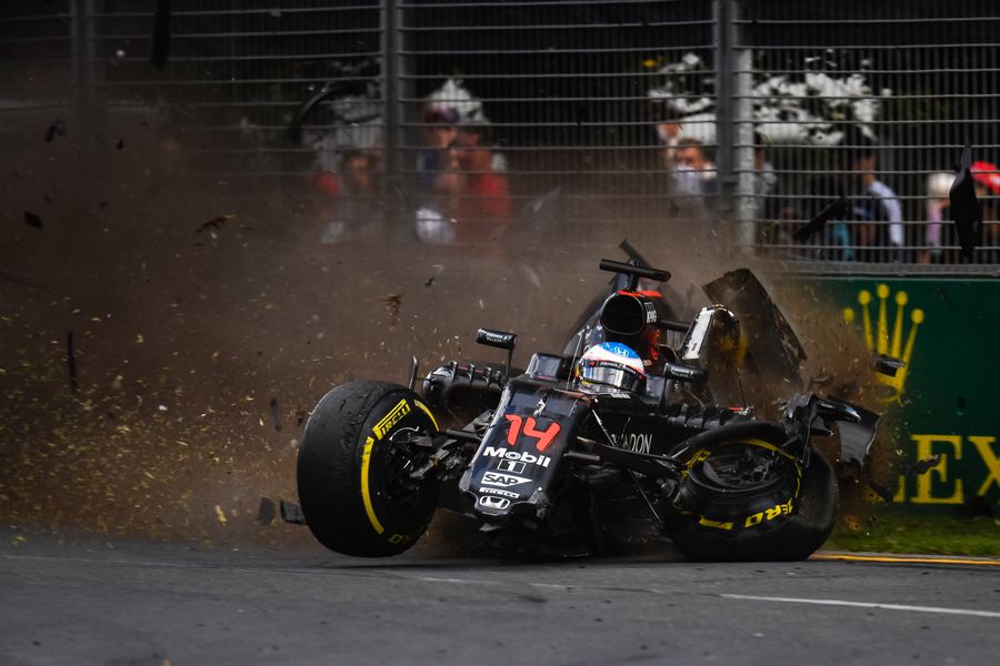 Fernando Alonso hits the wall after collision with Esteban Gutierrez