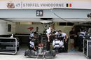McLaren mechanics prepare the MP4-31 for Stoffel Vandoorne