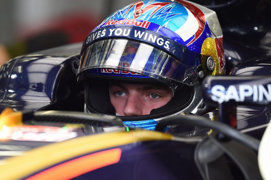 Max Verstappen in the Toro Rosso cockpit