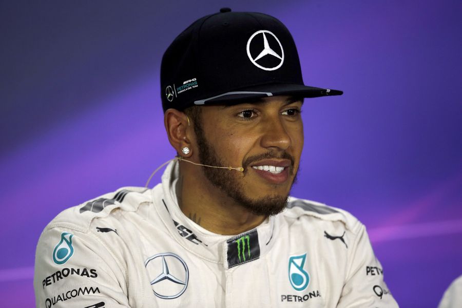 Lewis Hamilton talks to media in the press conference