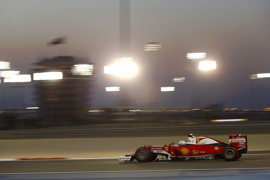 Sebastian Vettel works hard to keep its pace